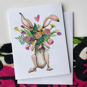 Cartoon Rabbit Holding Flowers